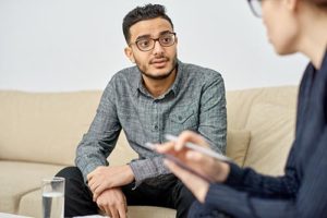 man at a cognitive-behavioral therapy program