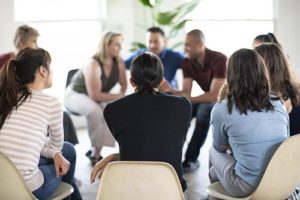 group at a group therapy program for addiction