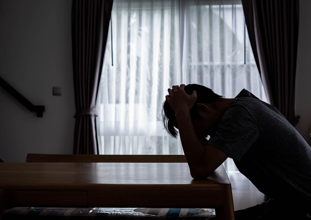 man thinking about heroin overdose symptoms